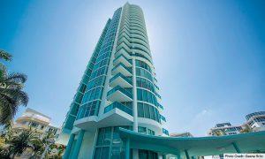The modern elliptical architecture of 6000 Indian Creek on Millionaire's Row