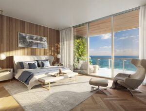 Luxury master bedroom at 57 Ocean Miami Beach with floor-to-ceiling windows