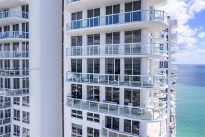 The modern glass silhouette of Akoya Miami Beach, the tallest oceanfront tower in the area