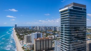 The modern glass exterior of 2000 Ocean Hallandale Beach boutique residences