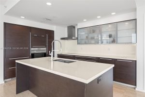 Modern designer kitchen with high-end appliances at Capri South Beach