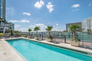 Luxury infinity pool overlooking Biscayne Bay at Capri South Beach