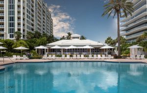 Luxury resort-style pool deck and cabanas at Missoni Baia Edgewater