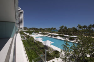 Oceana Bal Harbour pool area with Jeff Koons Seated Ballerina sculpture